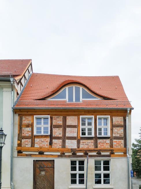 Ingenieros analizando modelos BIM y planos estructurales en una oficina moderna